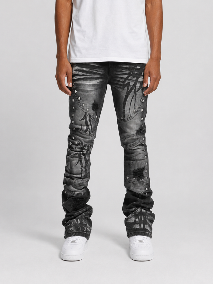 Black ash Taker Metal Studded Premium Stretch Stack Denim jeans with metal stud details, showcasing a fitted stacked denim style.