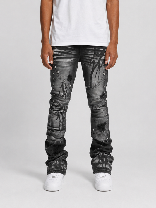 Black ash Taker Metal Studded Premium Stretch Stack Denim jeans with metal stud details, showcasing a fitted stacked denim style.