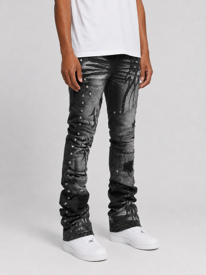 Taker Metal Studded Premium Stretch Stack Denim in Black Ash, showcasing the fitted denim with metal stud details.