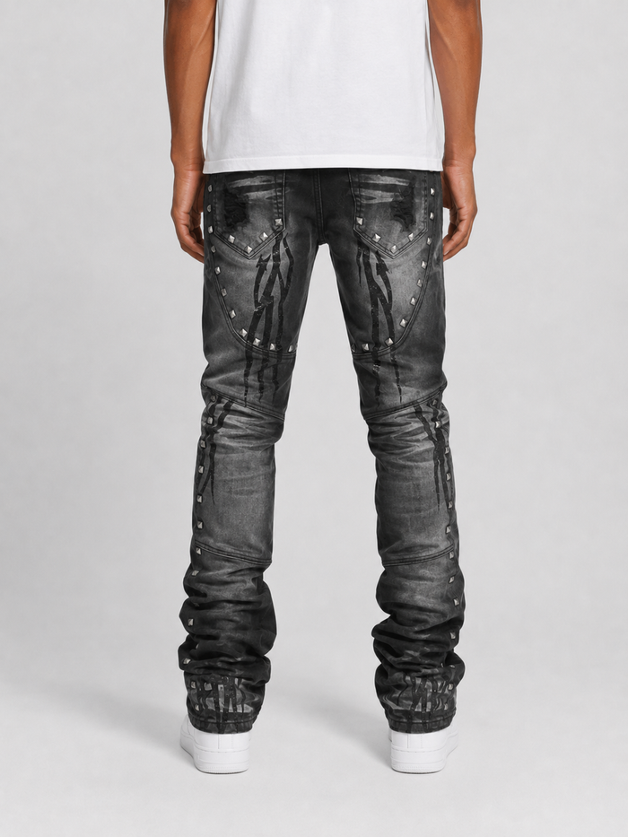 Taker Metal Studded Premium Stretch Stack Denim in Black Ash, showcasing the fitted black denim with metal stud accents.