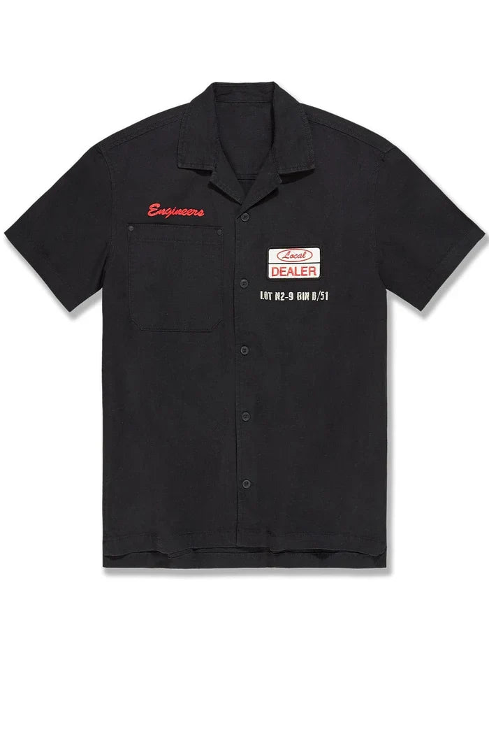 Black Jordan Craig The Re-Up Mechanic Button Up Shirt displayed on a mannequin, showcasing a classic design and tailored fit.