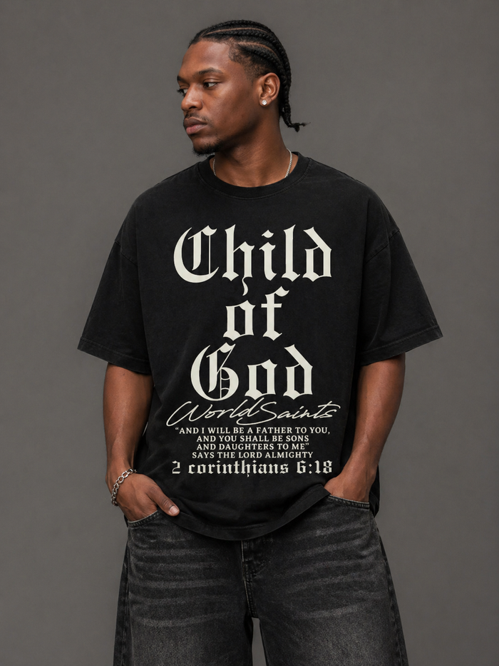 Black WRLDSNTS Child Of God T-Shirt featuring graphic design with inspirational text in a casual fit.