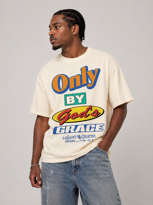 Cream WRLDSNTS 'Only By God's Grace' T-Shirt with printed text, casual fit, displayed on a plain background.
