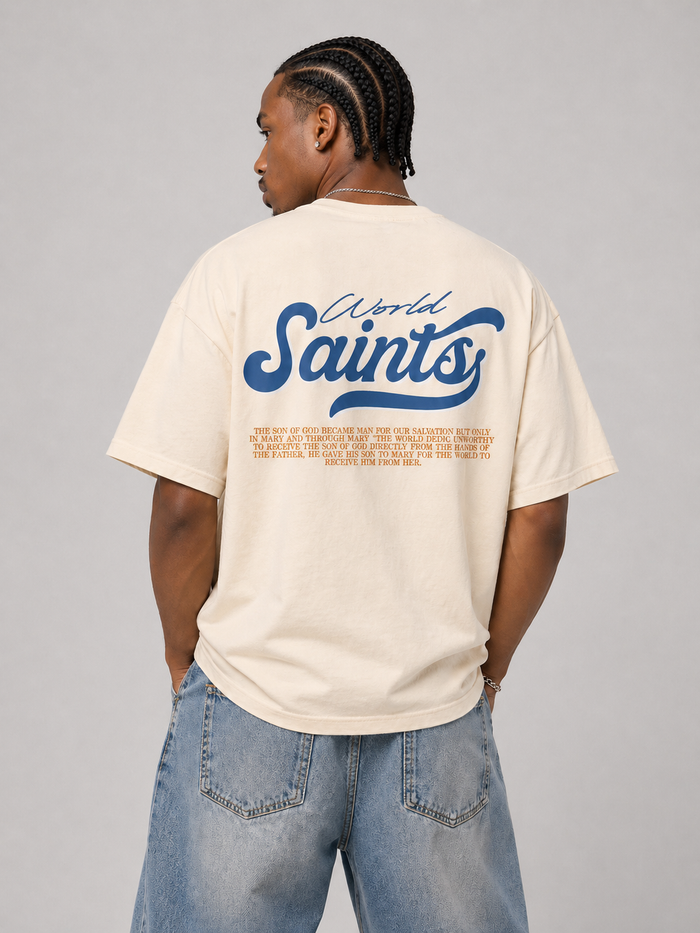 Cream WRLDSNTS 'Only By God's Grace' T-shirt with printed text, casual fit, and soft fabric.